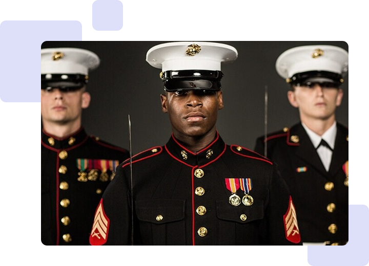 Three men in uniform are posing for a picture.