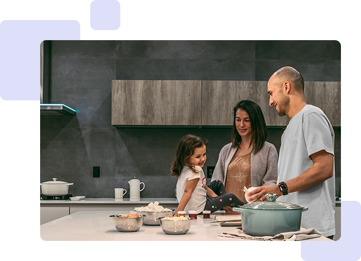 A family is cooking in the kitchen together.